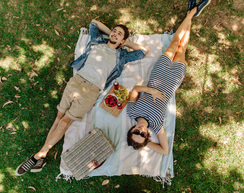 View,From,Above,Of,Relaxed,Man,And,Woman,Lying,Down