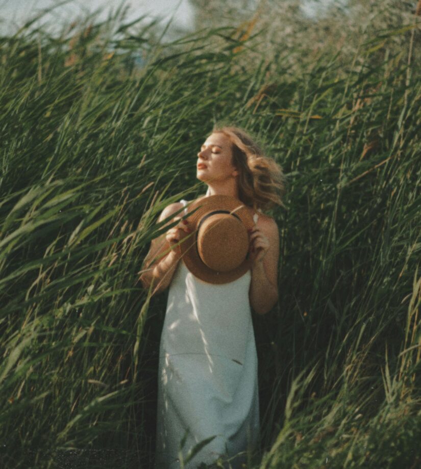 woman in tall grass